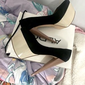 New condition ALDO PLATFORM HEELS sz9 baumernt